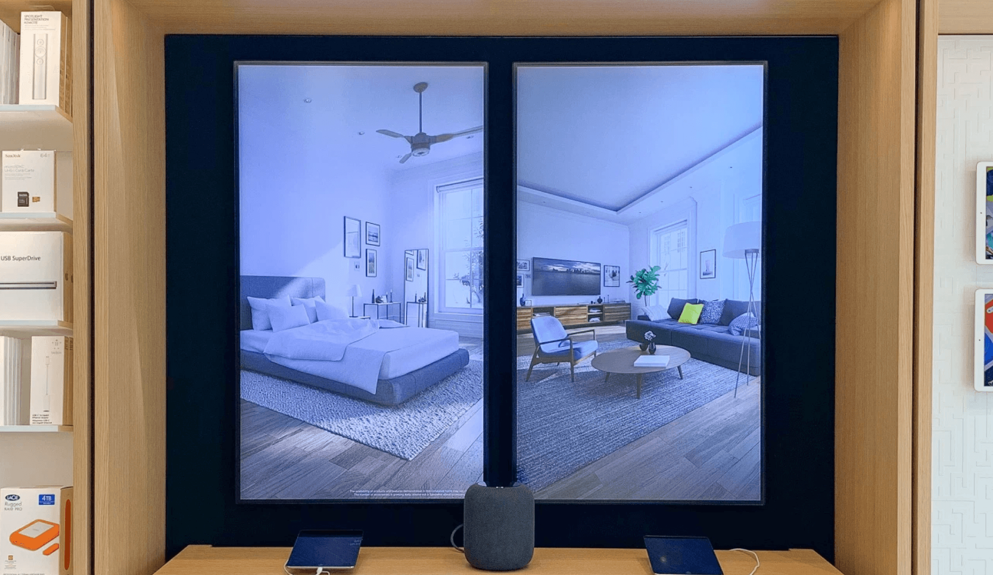 Apple Store retail display with home interior screens and product shelving